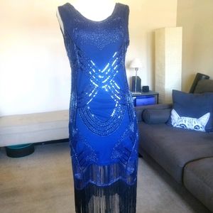 Beaded blue sleeveless dress with fringe